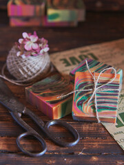 Fragrant multicolored handmade soap on wrapping paper.