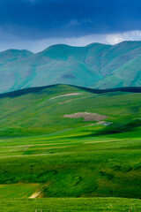 Obraz premium Piano Grande di Castelluccio, mountain and rural landscape