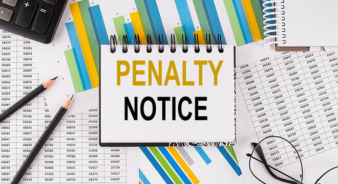 Closeup a notebook with text PENALTY NOTICE , business concept image on chart background