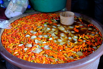 Nicaragua Granada - Traditional food stall with mixed chili peppers