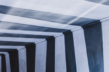 Arch transition in the house painted in black and white stripes
