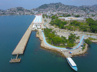 Aerial view from the sea of the Queen's Park and the Acapulco maritime terminal