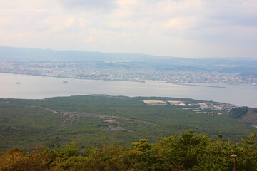 Fototapeta premium 桜島の風景。湯之平展望所からの景色。手前から大正溶岩原、錦江湾、鹿児島市街