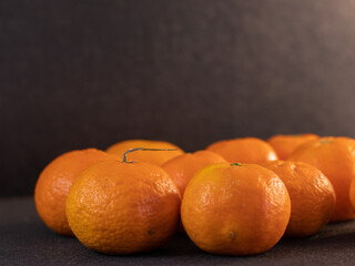 Group of oranges on black background