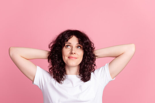 Top above high angle view photo of young woman arms behind head relax comfort isolated over pink color background