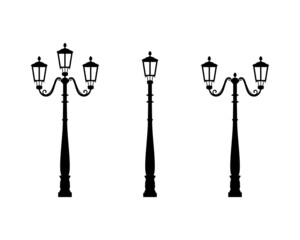 Set of street lights silhouettes. Black and white illustration, white isolated background.