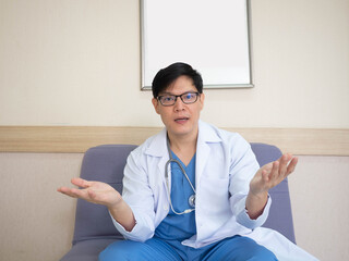 Hospital clinic laboratory doctor nurse scientist wear white uniform is looking at camera talk...