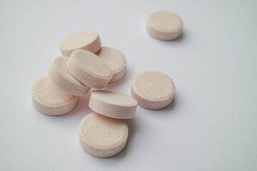 vitamins, pills and medicines are on the table. pills on a white background.