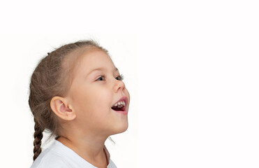 Isolated surprised child with open mouth on white background