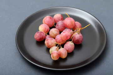 fresh grapes in the plate