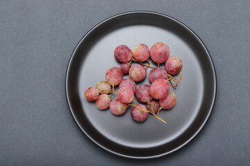 fresh grapes in the plate