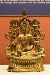 Vertical closeup of the statue of Buddha in the National Palace Museum, Taiwan. - obrazy, fototapety, plakaty