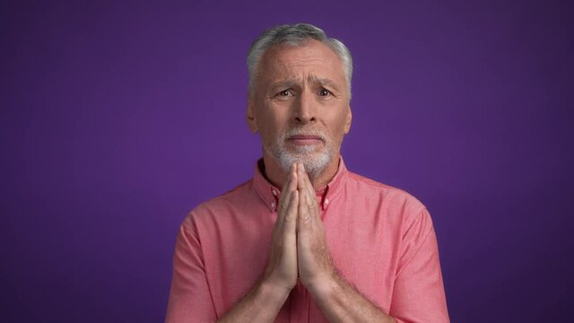 Frustrated man please hand gesture isolated vivid color background