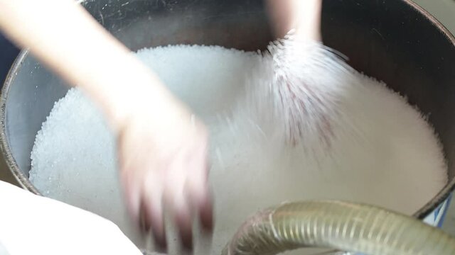 Man hand holding and mixes PP Pet Chips Semi Dull, PET chips recycle, PET polyester chips