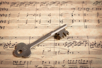 Musical score and an old key 楽譜とアンティークキー