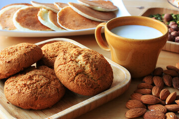 Biscuits, nuts and milk for breakfast