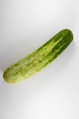 Green organic fresh cucumber isolated on white background