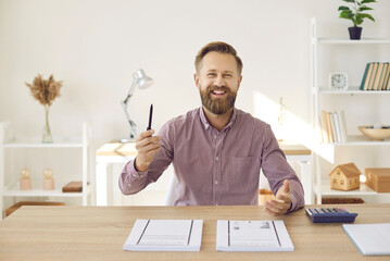 Happy bearded adult man sitting table, having virtual online business meeting via video call,...