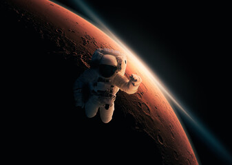 Astronaut or cosmonaut on spacewalk with planet mars in the background. Space expolarion, travel and science of stars. Elements in the image furnished by NASA.