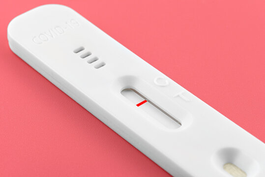 Coronavirus negative antigen test for nasal swab, isolated on a pink background with clipping path.