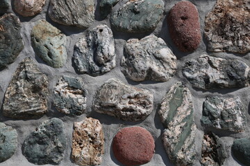 Stone wall field stone and concrete natural building texture