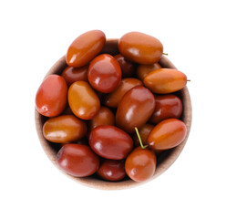 Ripe red dates in bowl on white background, top view
