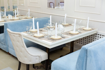 Elegant wedding banquet decoration and table setting in the restaurant.