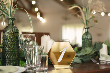 Guest table number. Wedding table in the restaurant.