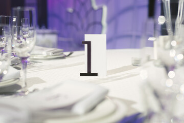 Guest table number. Wedding table in the restaurant.