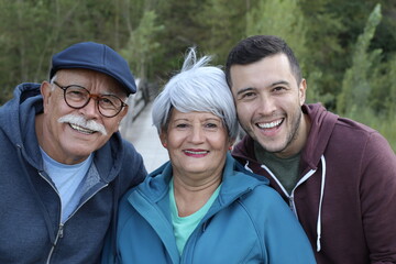 Two-generation Hispanic family outdoors