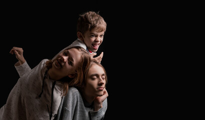 A girl plays with her younger brother