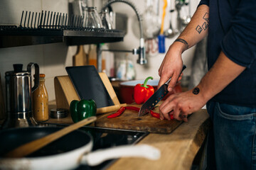 close up of man preparing lunch in his kitchen