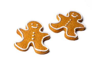 Fototapeta na wymiar Christmas homemade gingerbread cookies, gingerbread man on the white background