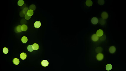 New year bokeh background . Green lights