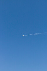 Military airplanes performing stunts in clear blue sky. Airshow