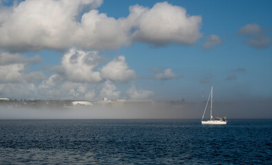 a strip of fog in Halifax Bay. Nova  Scotia. Canada