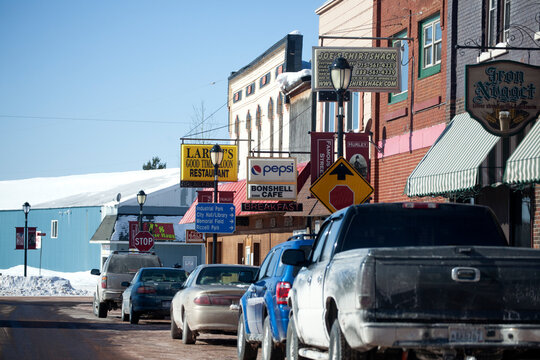 The many shops, stores and restaurants lining the downtown street. Hurley Wisconsin WI USA