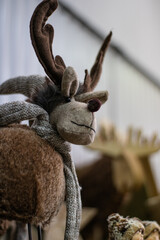 Warm reindeer doll in brown tones. Rustic mood for a Christmas homedecor.
