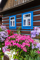 Fototapeta na wymiar Old wooden houses in village Osturna, Spiska magura region, Slovakia