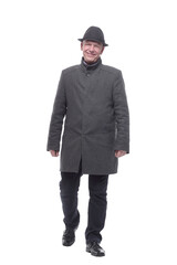 Fototapeta premium intelligent man in an autumn coat striding forward.
