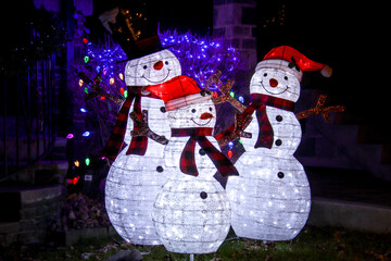 Family of snowmen, outdoor Christmas decorations