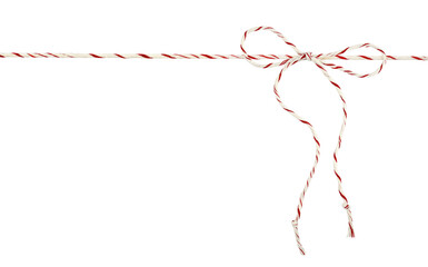 White and red Christmas wrapping rope tied in a bow isolated on white