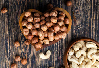 dried cashew nuts on a wooden table