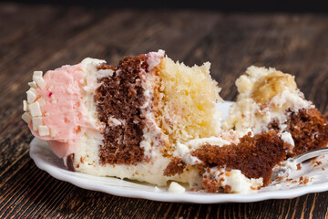 delicious cake made of mixed cakes and strawberry and banana fillings