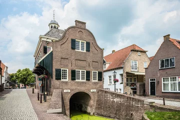 Foto op Canvas The town hall of the fortified town of Nieuwpoort., Zuid-Holland province, The Netherlands © Holland-PhotostockNL