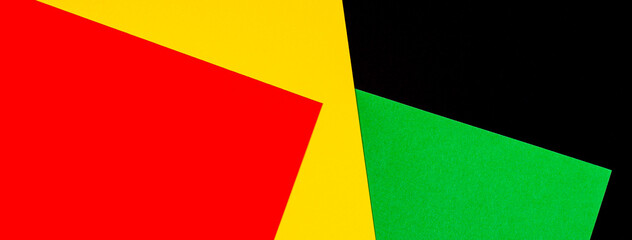 Abstract geometric black, red, yellow, green color background. Black History Month color background with copy space for text