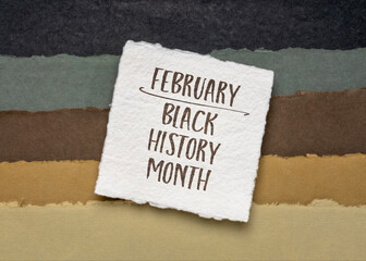 February - Black (African-American) History Month, handwriting against abstract paper landscape in earth tones, annual observance originating in the United States