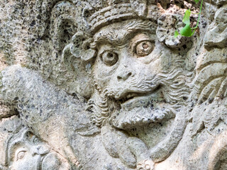 Fototapeta na wymiar Indonesia, Bali, Ubud. Statue in Pura Tirta Empul temple