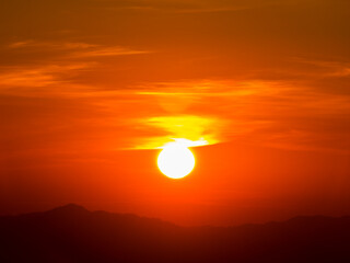 sunset in sky clouds and mountain background