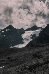 mountain landscape with clouds in the alps